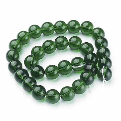 Стъклена мъниста в зелен прозрачен цвят 10 мм наниз
