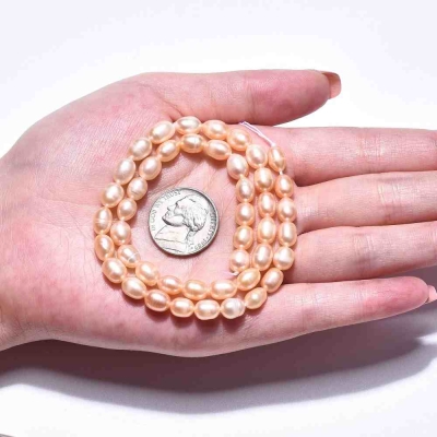 Естествени сладководни перли от клас AA, овални 7мм ръка